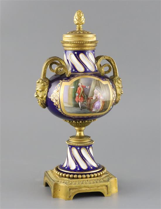 A late 19th century French ormolu mounted Sevres style porcelain cassolette, height 12.5in.